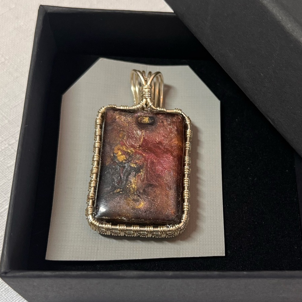 Wire wrapped resin necklace pendant. Handmade. Unique. Silver wire.